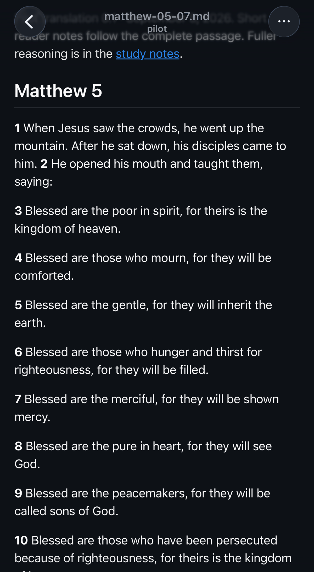 Dark-mode text page displaying Matthew 5, verses 1–10, with back and menu buttons at the top.